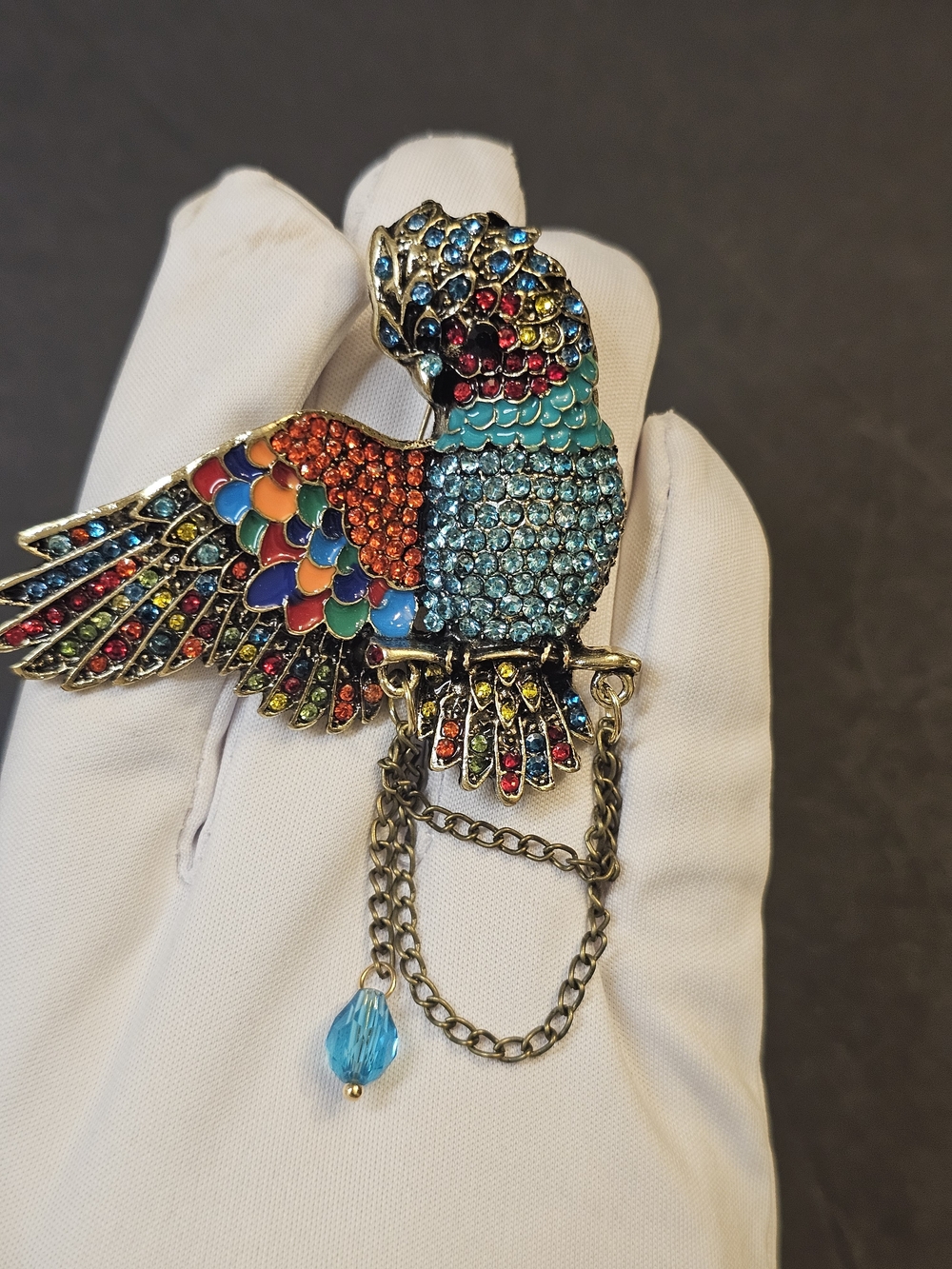 Multicolor Crystal Parrot Enamel Brooch with Blue Teardrop Accent